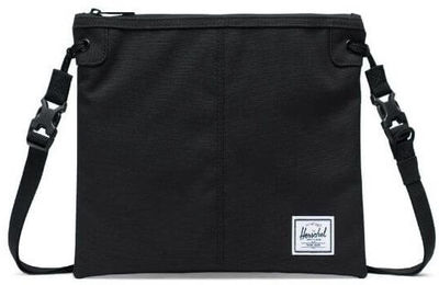 Am image of a Custom Herschel Adler Crossbody Tote in Black!