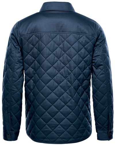 Am image of a Custom Stormtech Men's Bushwick Quilted Jacket in Indigo!