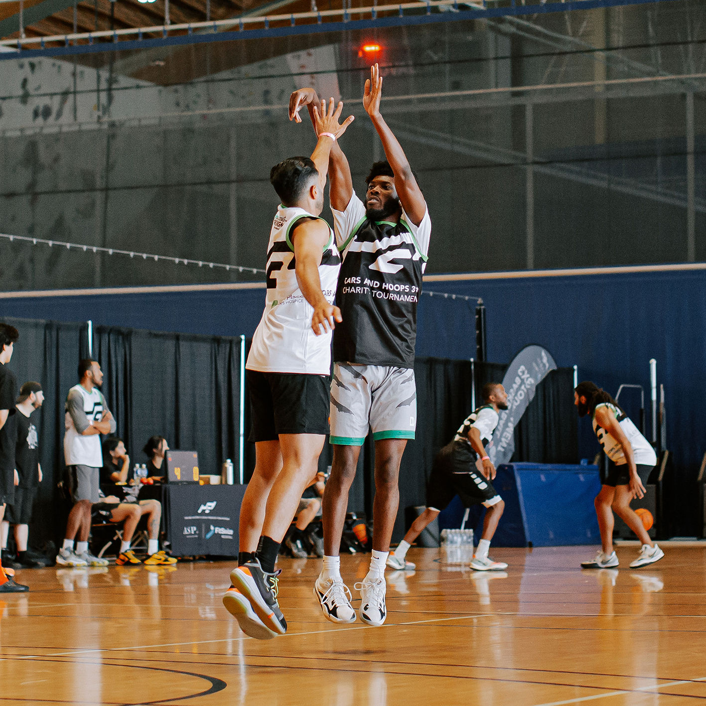 A basketball player wearing the sublimated jerseys we printed for a charity basketball event.