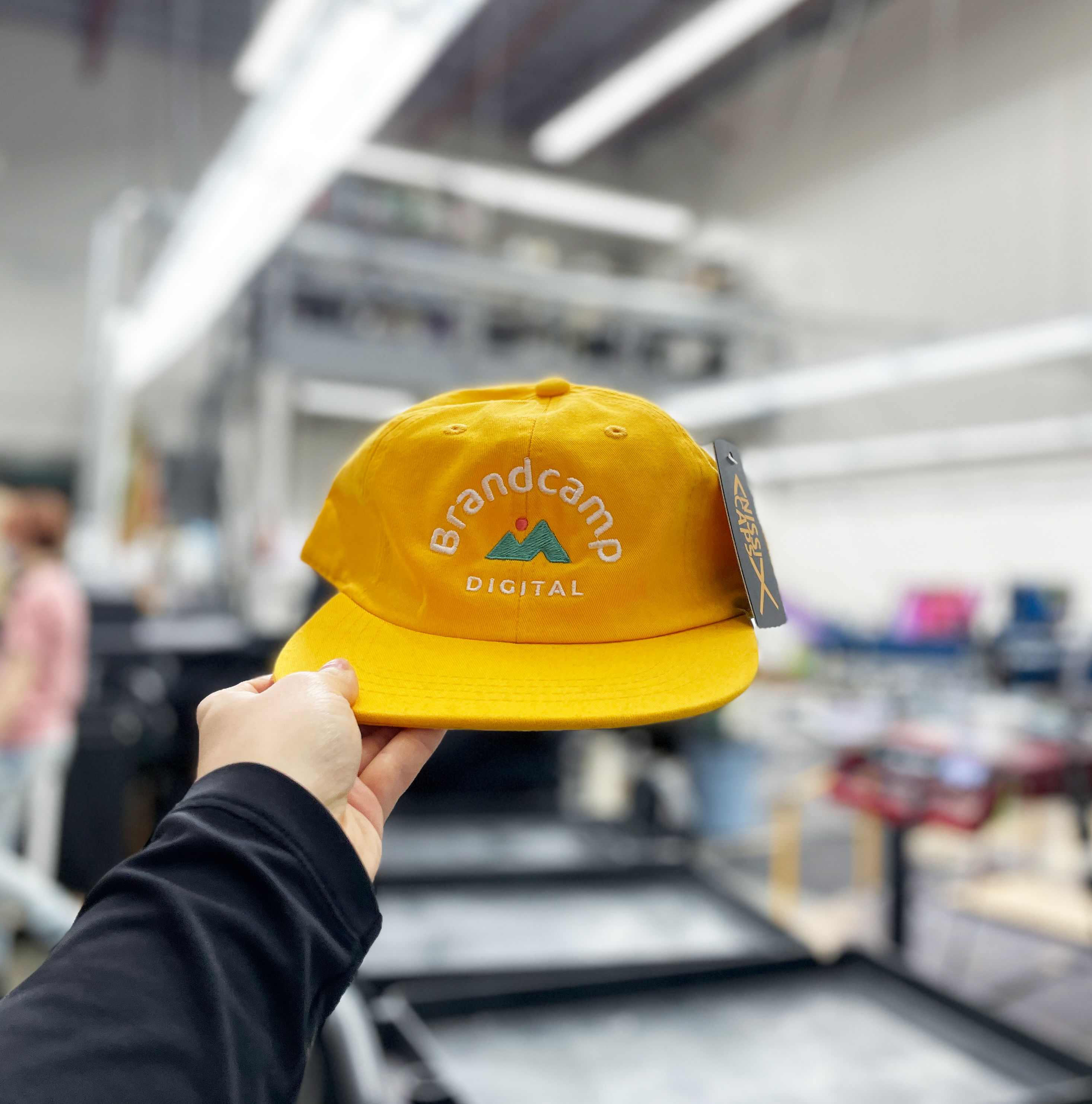 Embroidered Brand Camp flat brim hats.