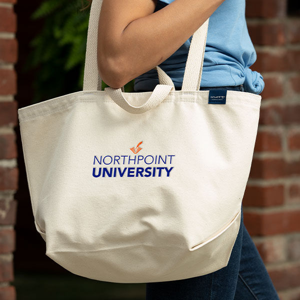 A branded tote bag printed for a university.