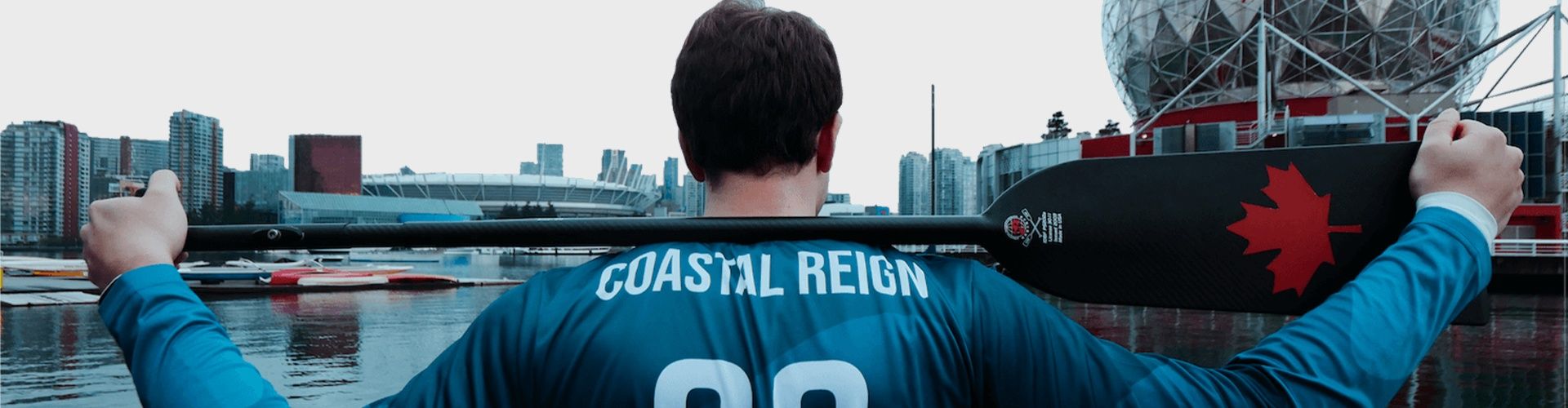 An image of a dragon boater wearing a custom dragon boat jersey we printed!