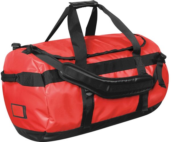 Am image of a Custom STORMTECH ATLANTIS WATERPROOF GEAR BAG M in BOLD RED / BLACK!