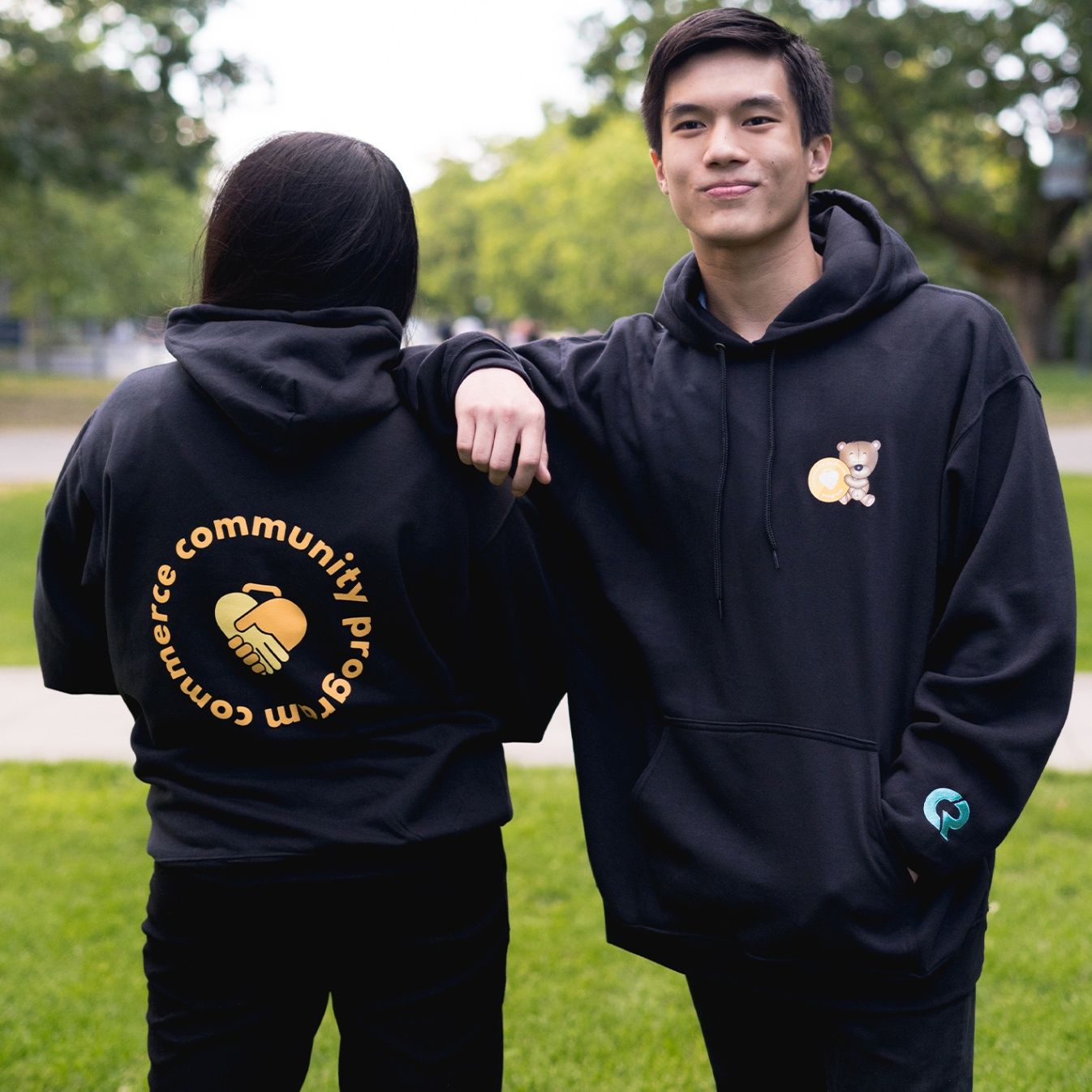Custom printed hoodies with a front and back design for a university club