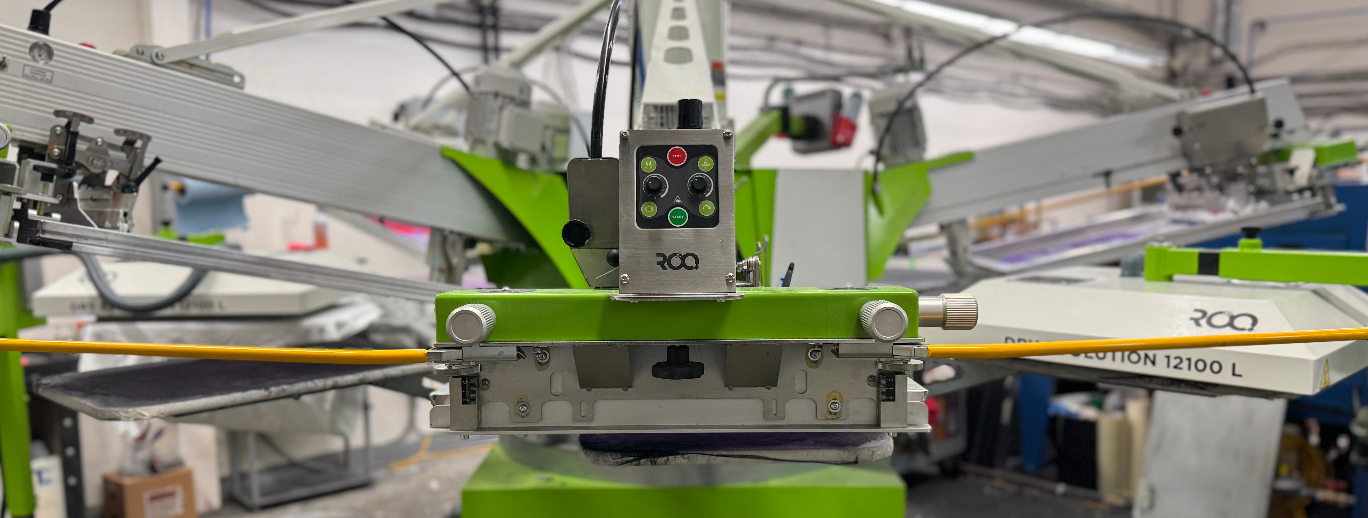 An image of our ROQ automatic screen printing machine.