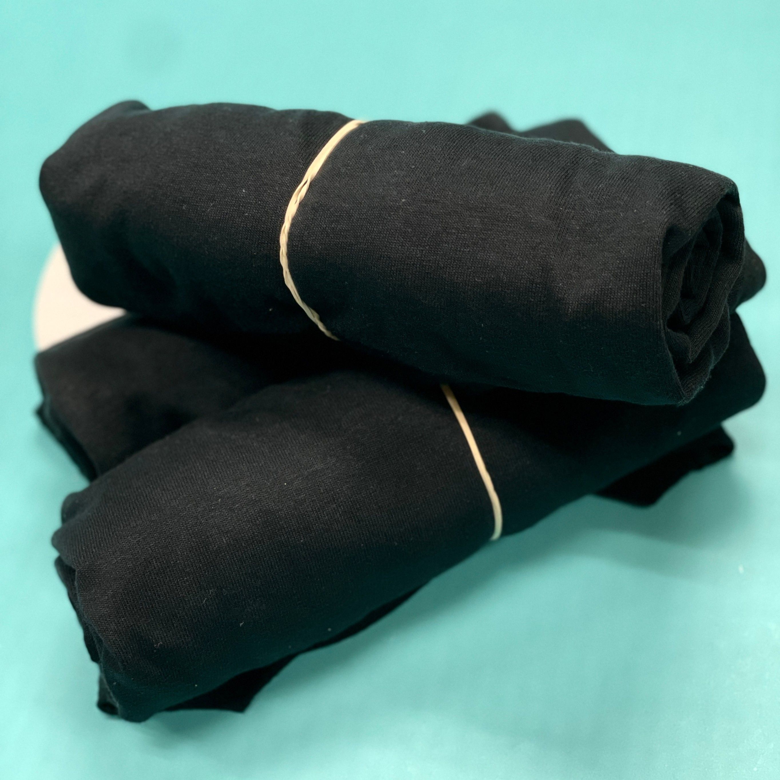 An image of individually rolled garments