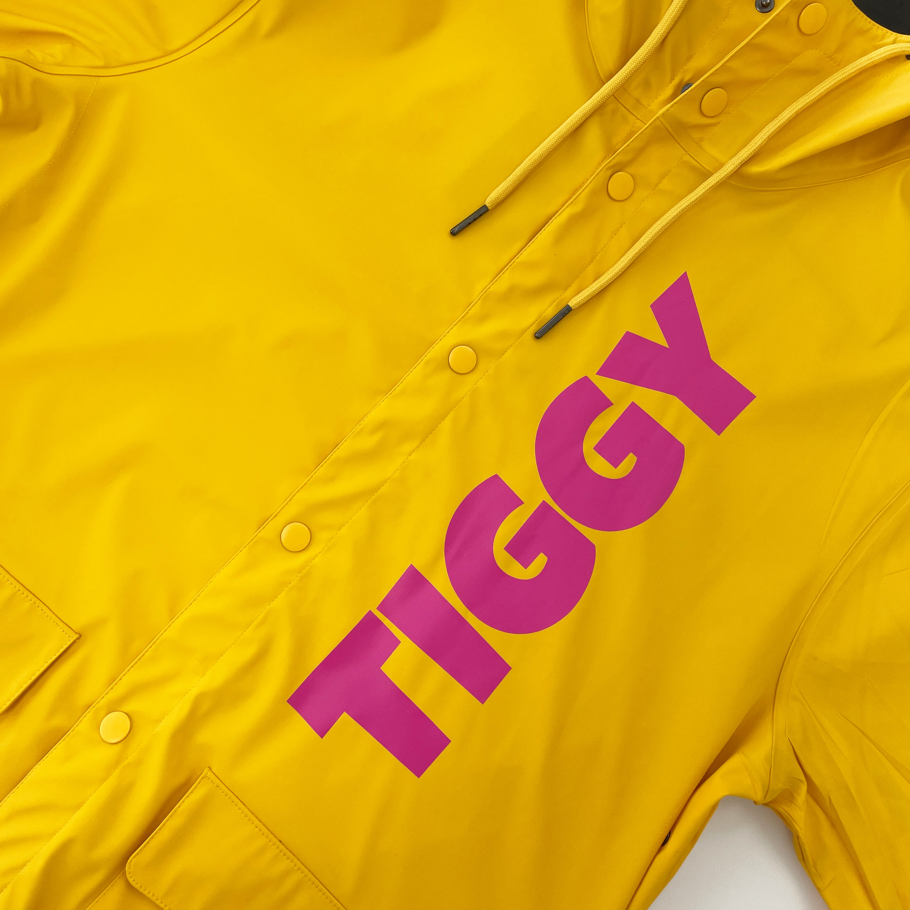 Close-up of a DTF-printed logo on a waterproof rain jacket