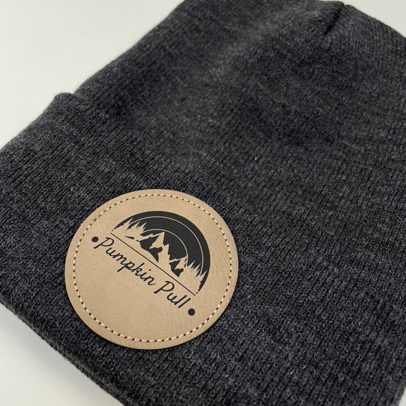 An image of custom leather patch toques.