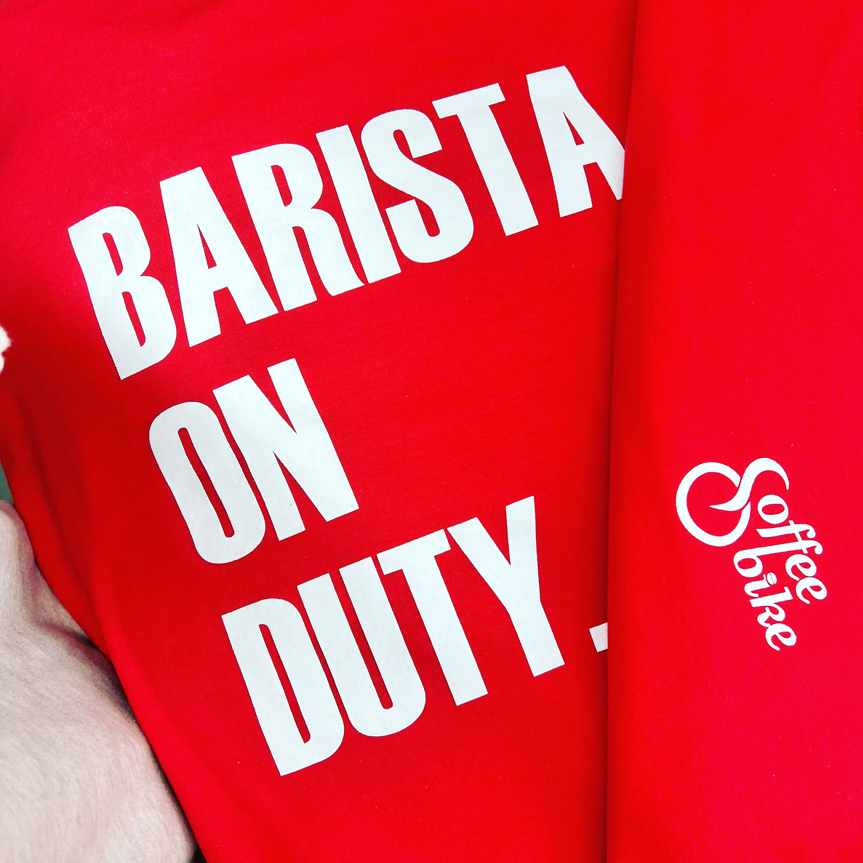 Screen printed design on the front and the sleeve of a long sleeve t-shirt