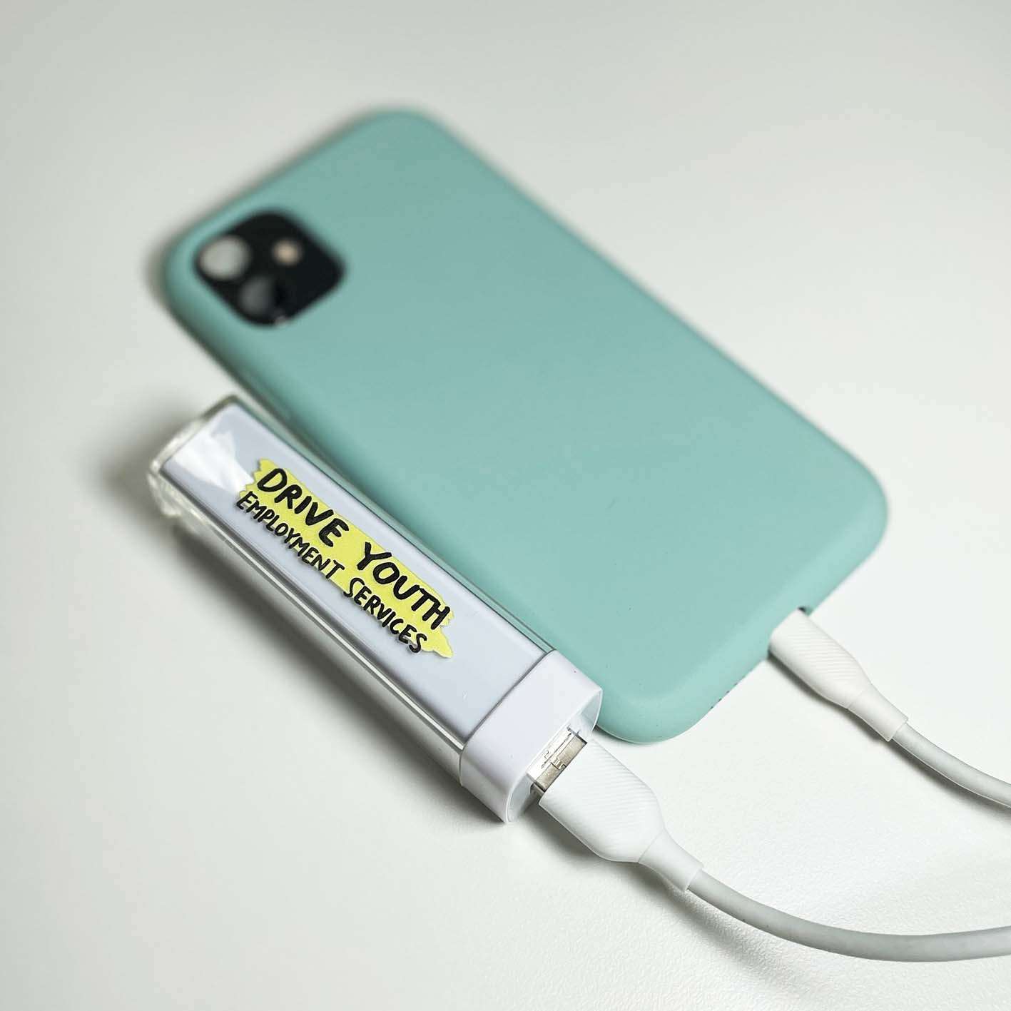 An example of screen printed custom portable chargers.