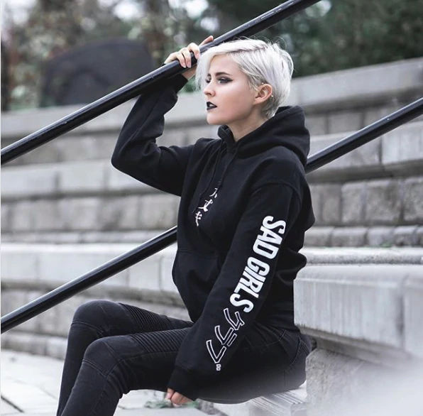 An image of a screen printed sleeve print on a bulk custom hoodie order.
