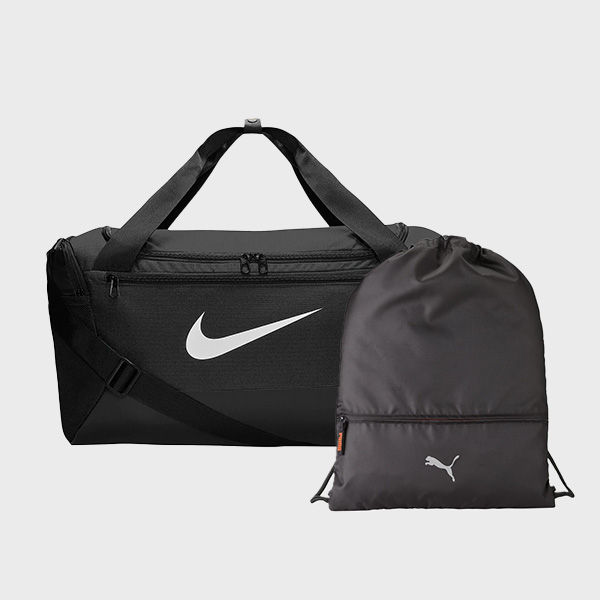 Black Nike duffel bag with white swoosh logo next to a black Puma drawstring sports bag with a white Puma logo.
