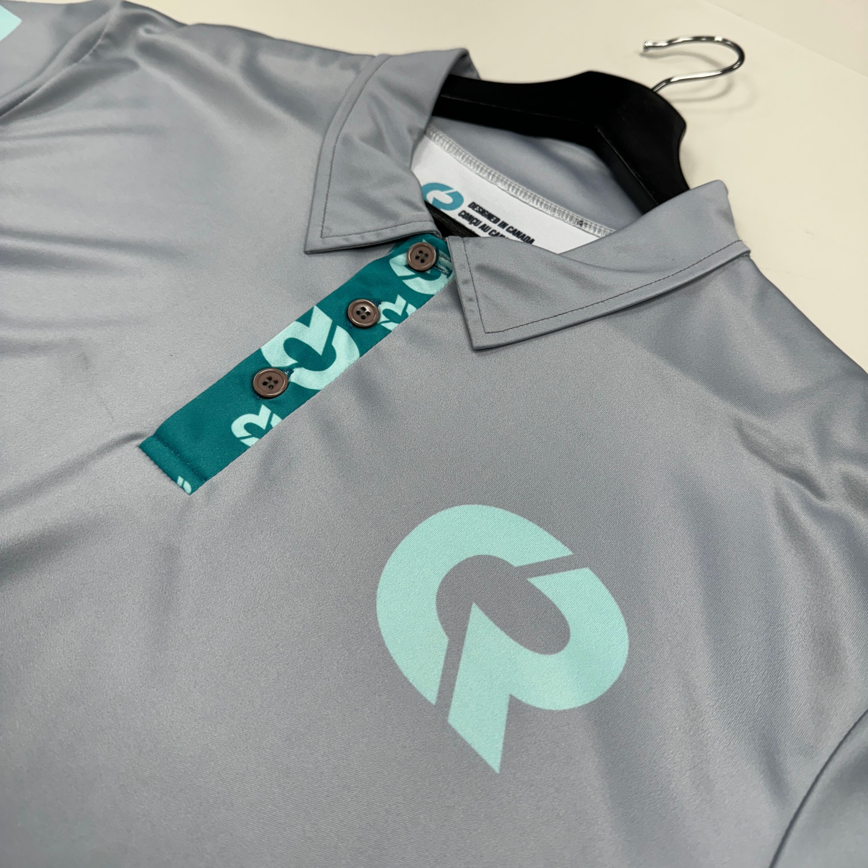 An image of a custom sublimated polo shirt that you can freely print your design on!