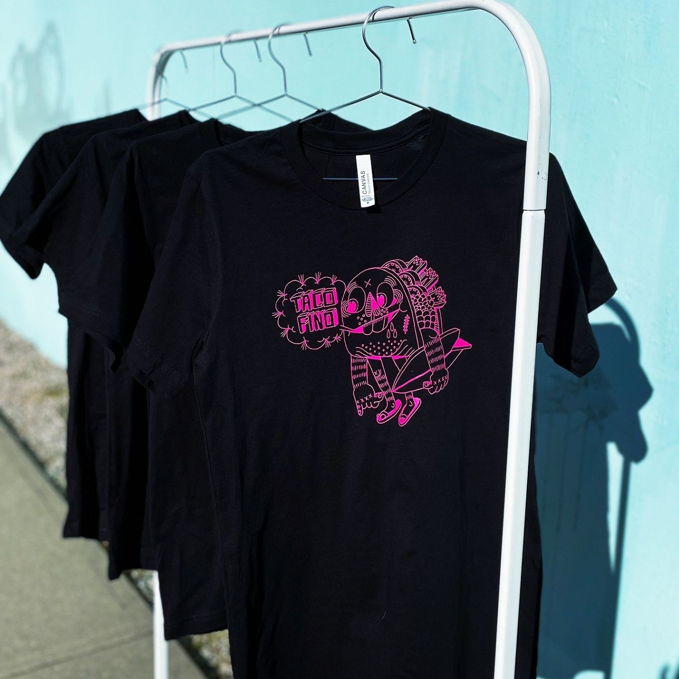 An image of custom t-shirts that we screen printed for tacofino