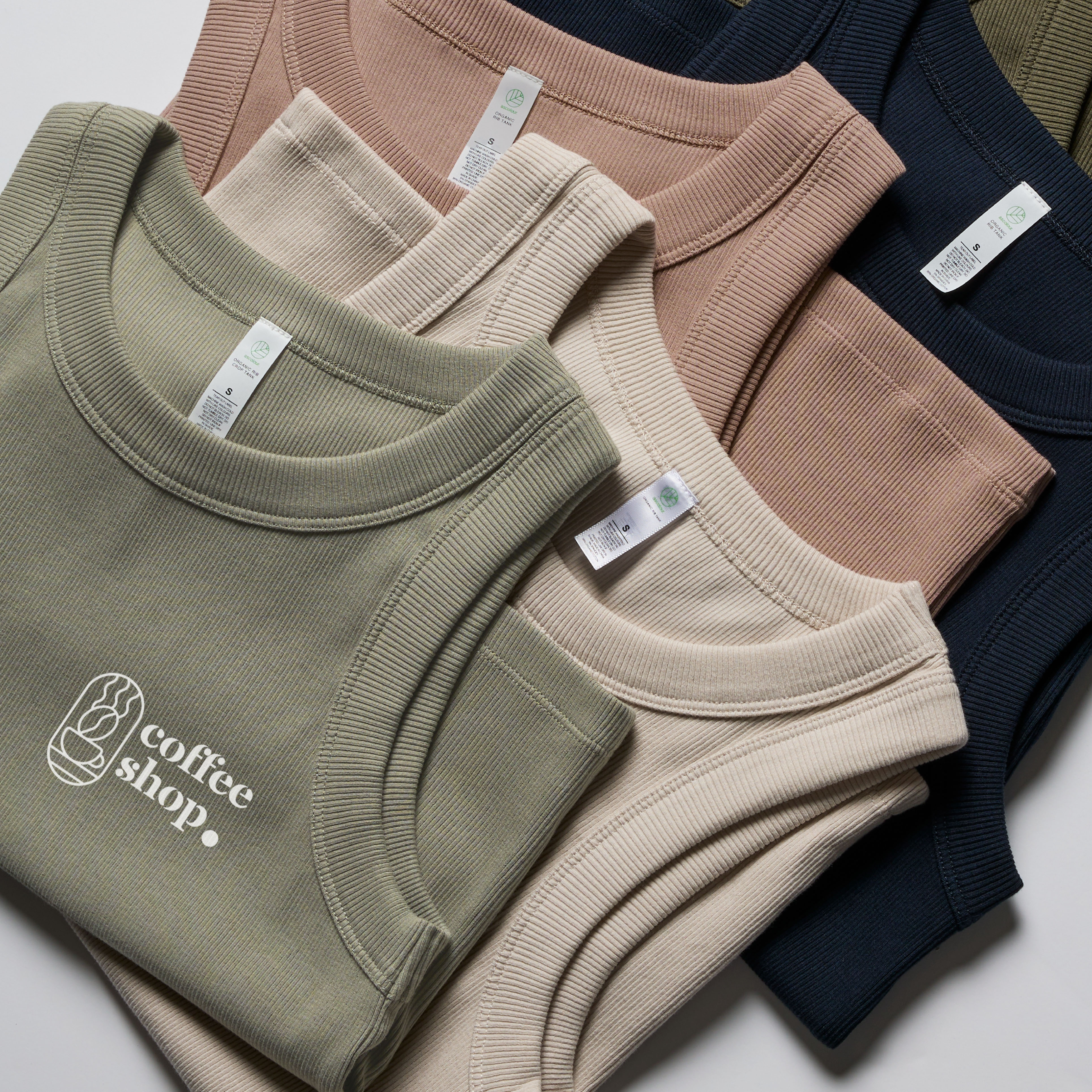 Customizable micro rib tank tops ideal for printing logos, graphics, or brand designs.