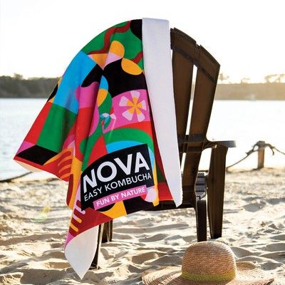A custom sublimated beach towel that you can print a colorful design on!