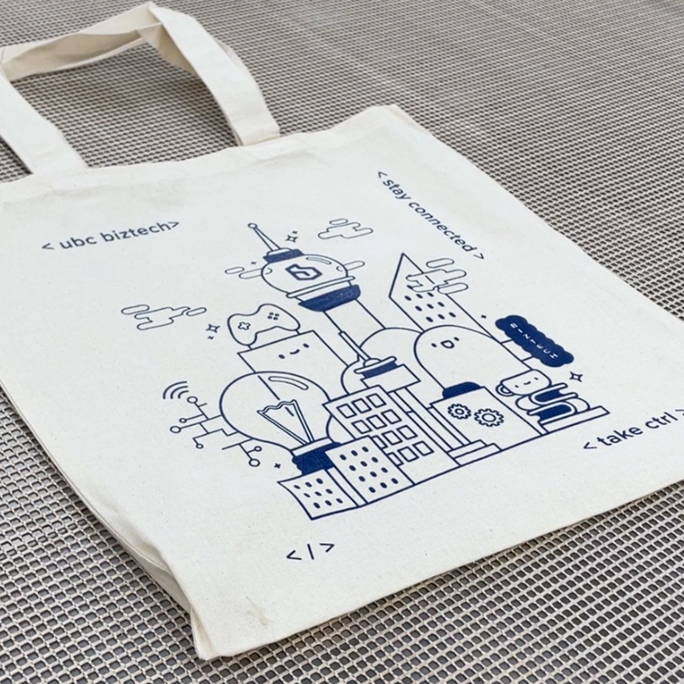 An image of custom tote bags we printed for UBC Biztech