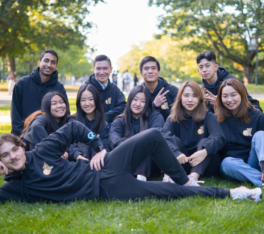 An image of a ubc sauder club wearing custom hoodies we printed