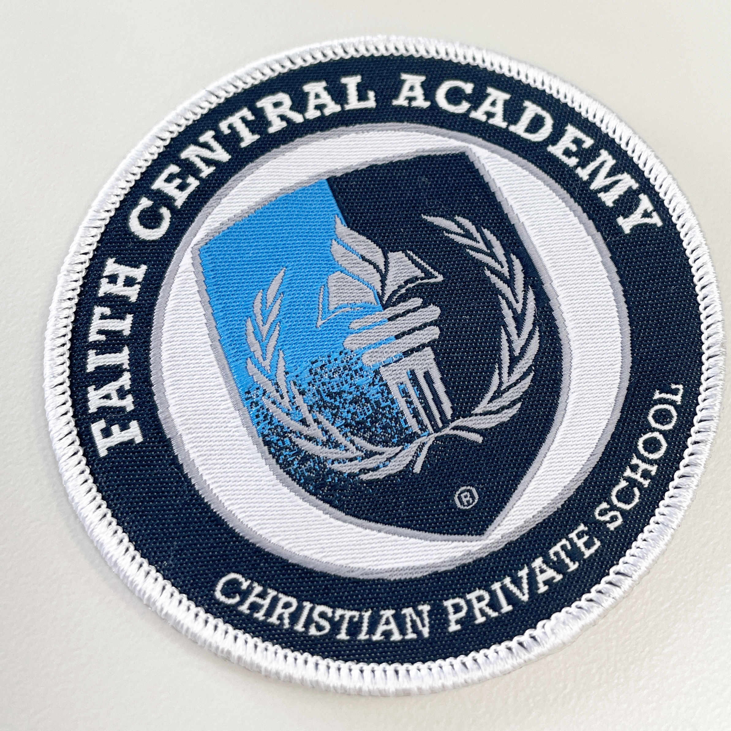 An image of custom woven patches that you can print your logo or design on!