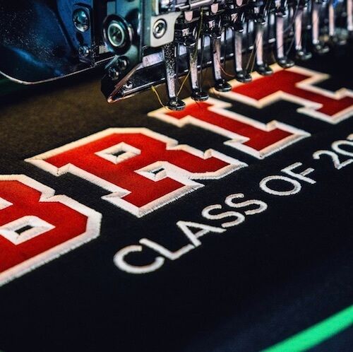 A close-up image of applique printing, a print method that is popular among schools.