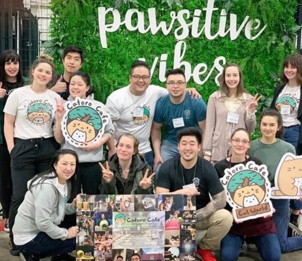 An image of the Catoro Cafe team wearing the shirts we printed for them!