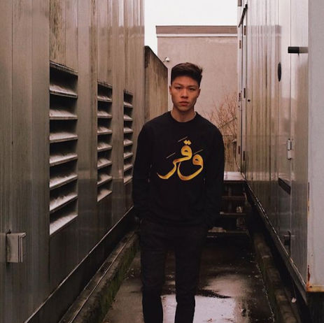 Full embroidery done on a black custom crewneck sweatshirt.