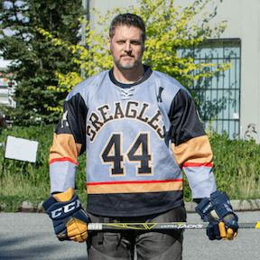An image of the Cuppa Joe Team wearing the hockey jerseys we printed for them!