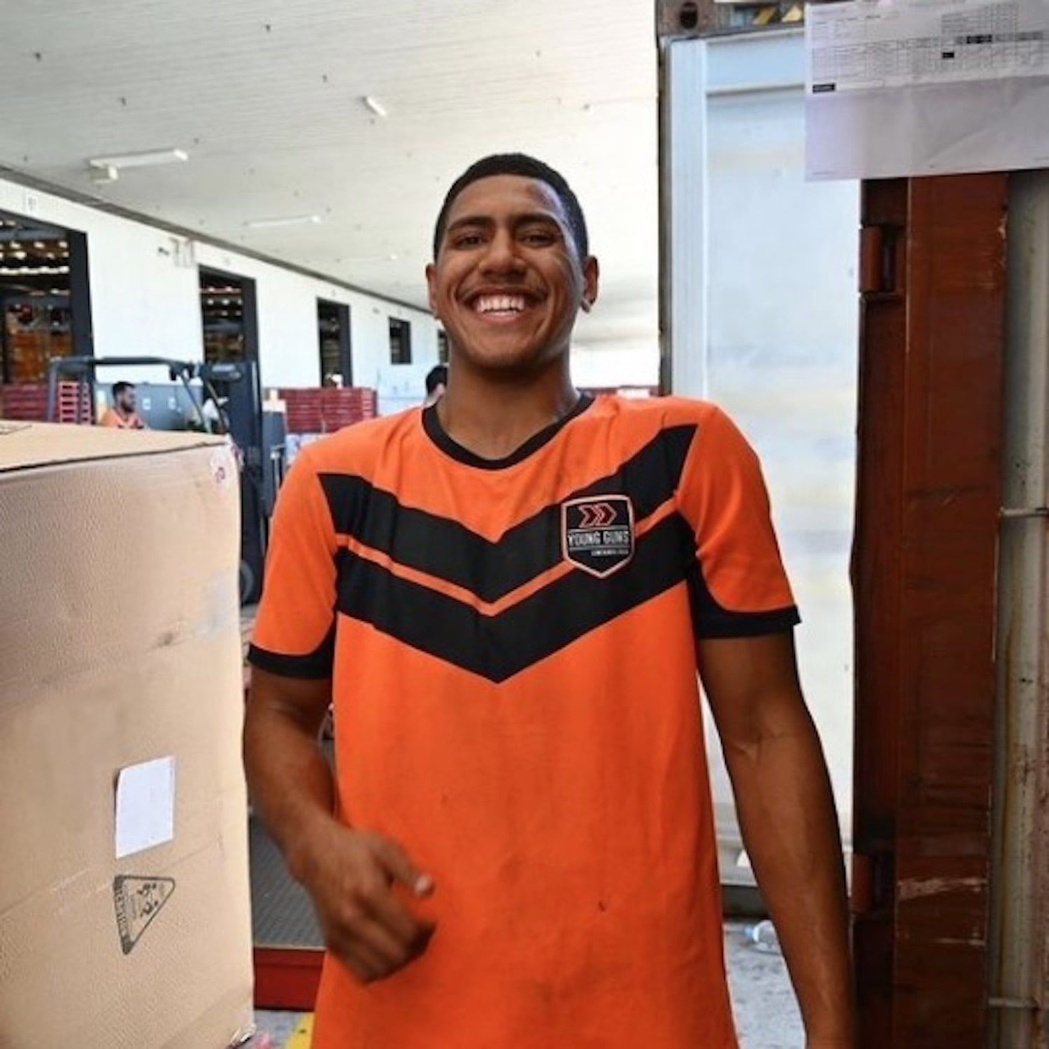 An image of someone wearing a sublimated jersey we printed for Young Guns.