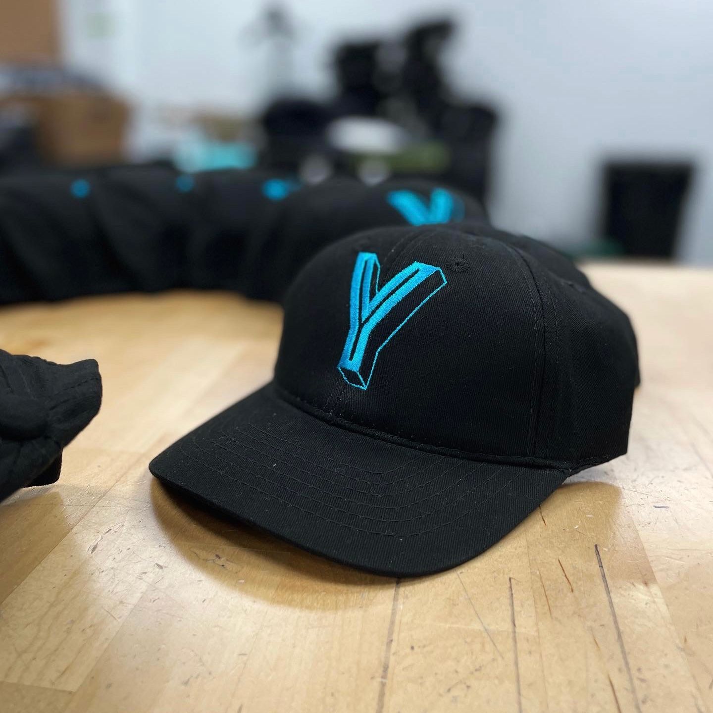 An embroidered design on a hat for Yell