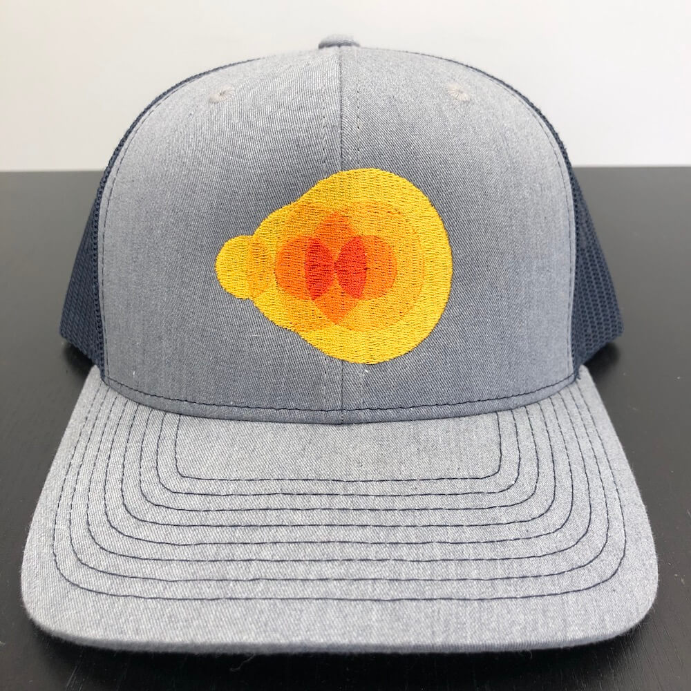 An image of an embroidered design we printed on a trucker hat