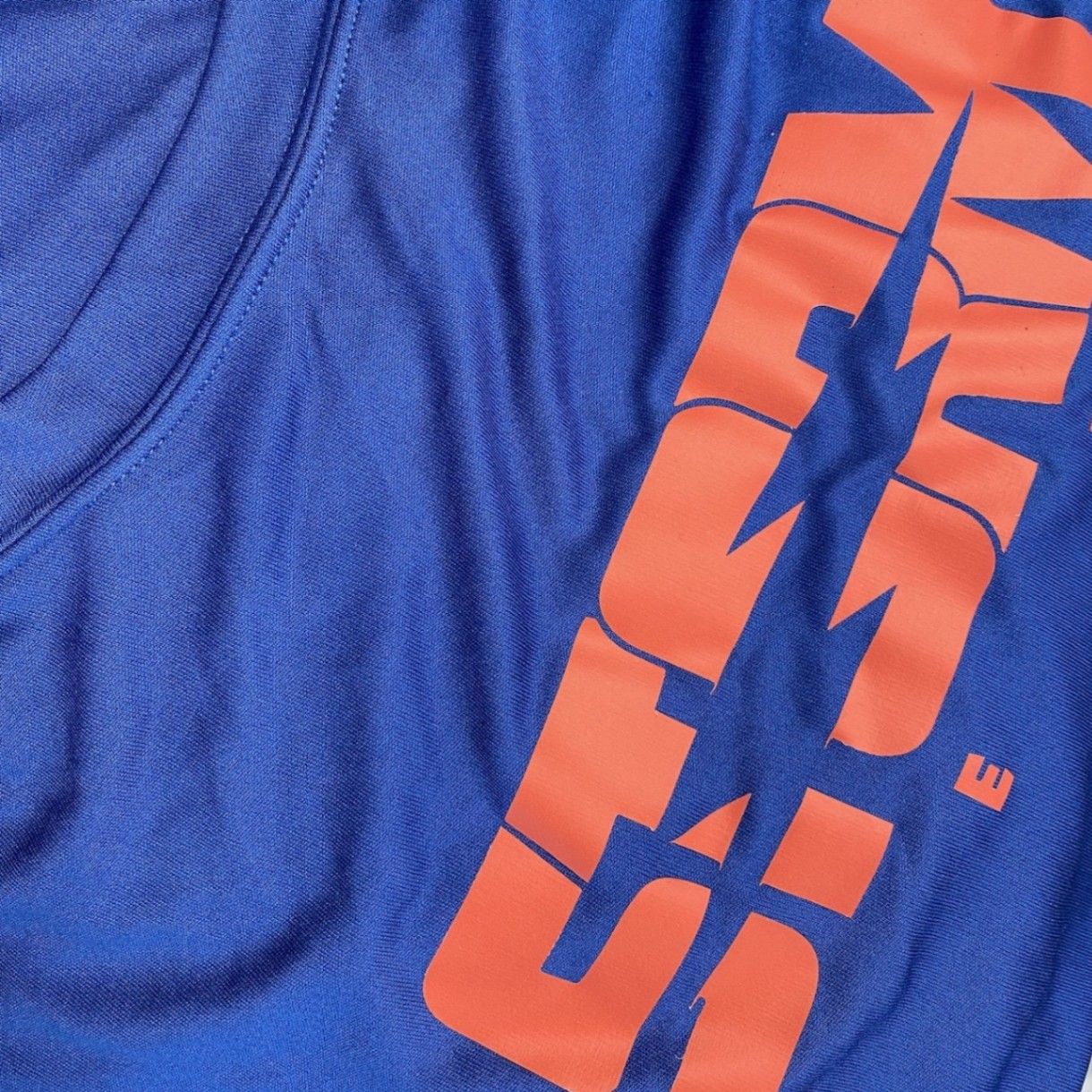 An image of a screen printed youth custom jersey that we printed!