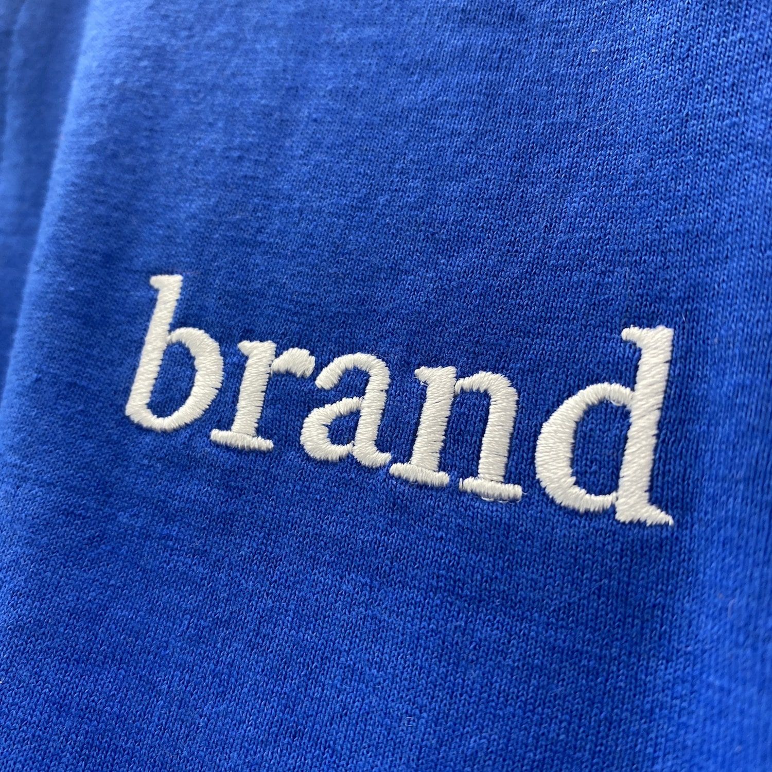 Close up of an embroidered design on a polo shirt