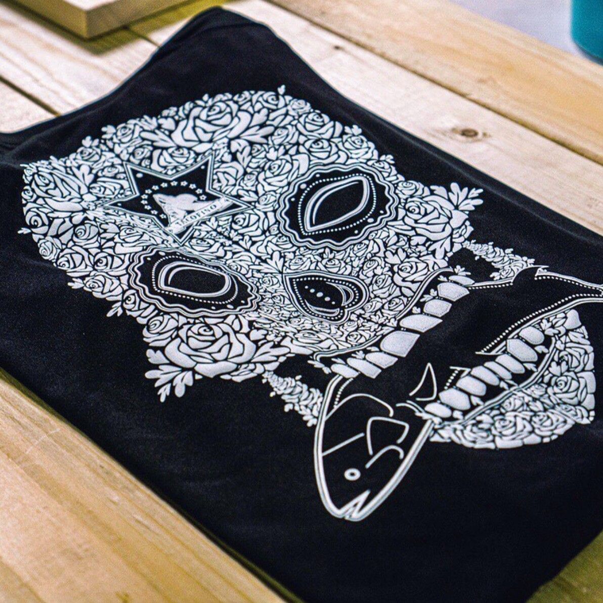 An image of a one color screen print we printed for a Taco Store.