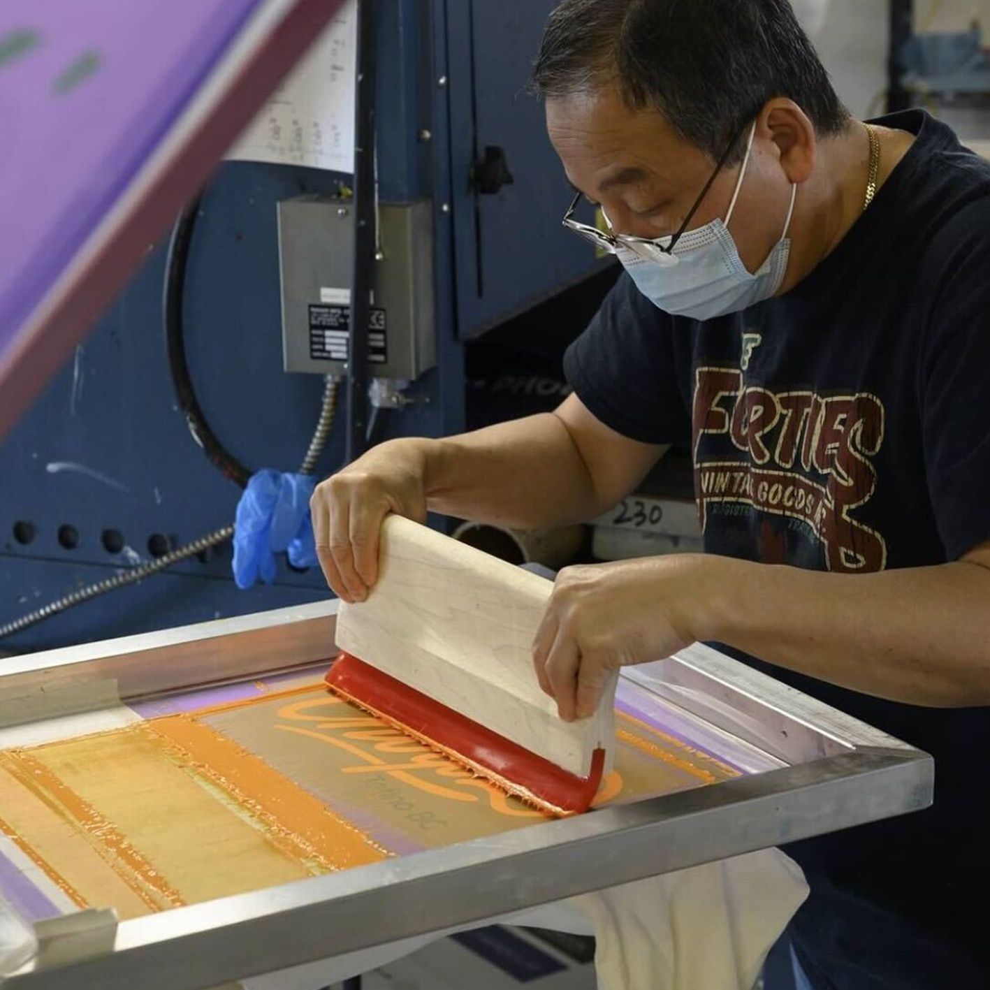 An image of Coastal Reign staff working in the warehouse