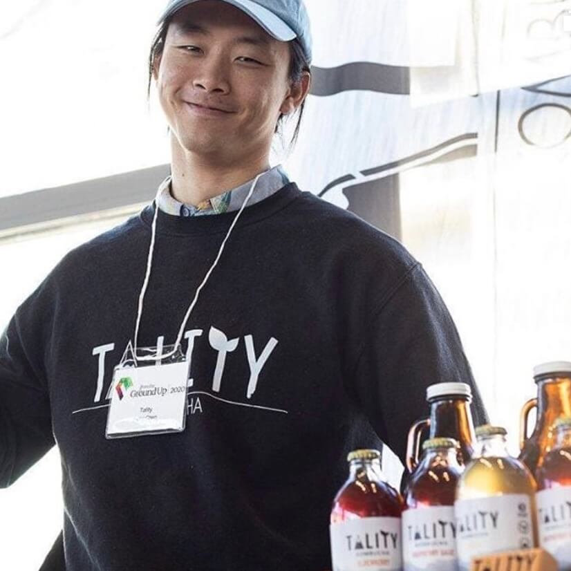 An image of the Tality Kombucha team in action.